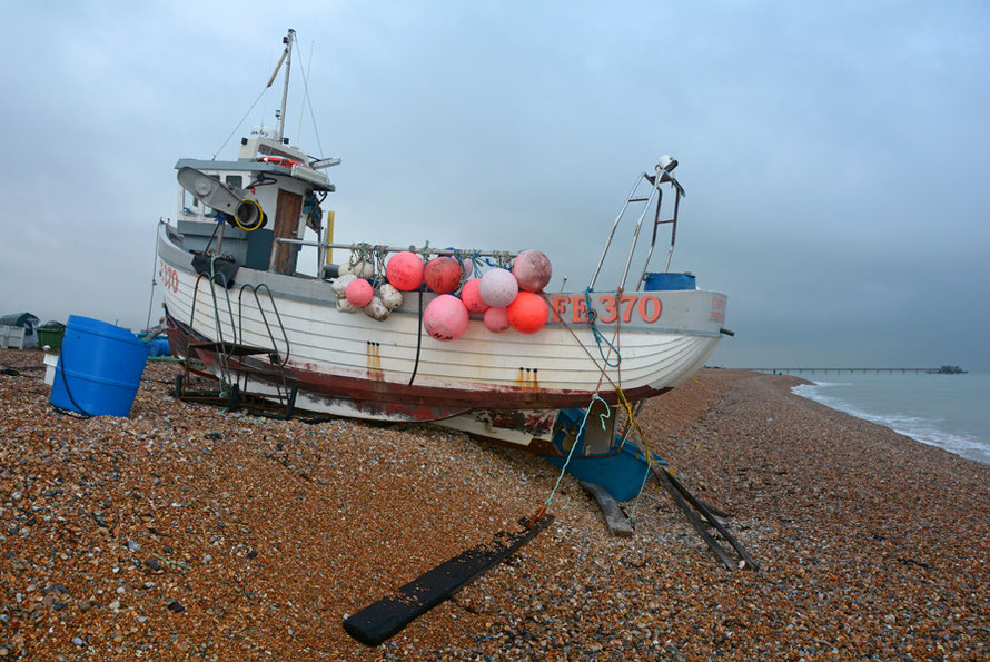 Coptic - FE 370 - at her shingle berth at Deal, Kent with a dropping tide and freezing north-westerly winds. Flash and 'neutral' on the picture setting.