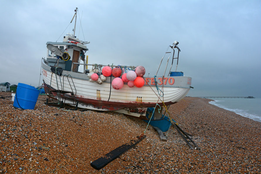 Coptic - FE 370 - at her shingle berth at Deal, Kent with a dropping tide and freezing north-westerly winds. Flash and 'neutral' on the picture setting.