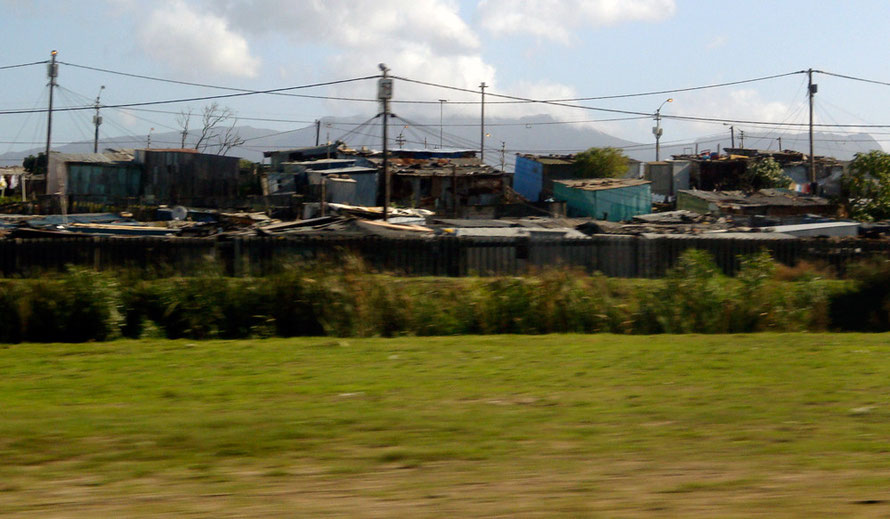 Informal settlement on the N2 heading towards Cape Town (c) Peg Murray Evans