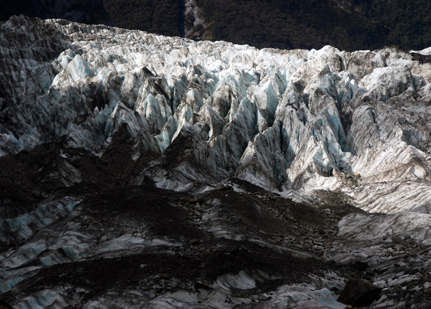 Crevasses worn down to arretes by melting and heavy rainfall at tht terminus of the Fox Glacier