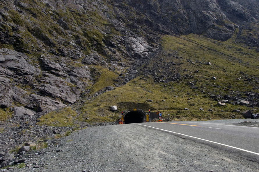 The eastern entrance to the Homer Tunnel. It is 512m (1,679ft) to the arete above the tunnel and a permanent snowfield sits to the left at 1800m under  Mts Moir and Belle (1,695m).