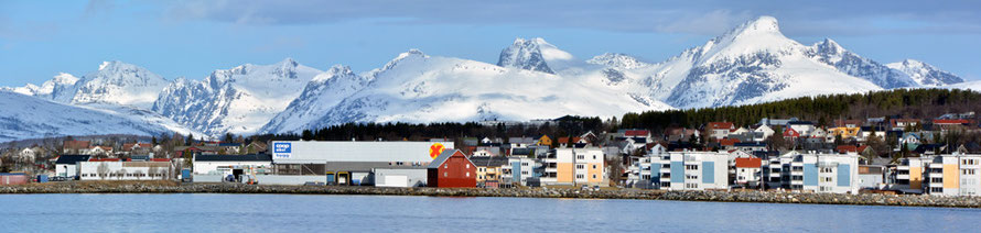 The south eastern end of Tromsøy Island (Bjerkaker) and the mountains to the west of Kvaløya Island.