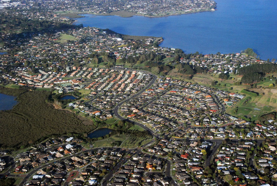 This is Wattle Downs, built on the edge of the Pahurehure Inlet of the Manukay Harbour (see mangroves on left) as Aucklland has expanded south and north of the old centre. Wattle Downs is a couple of kms south of Manurewa.