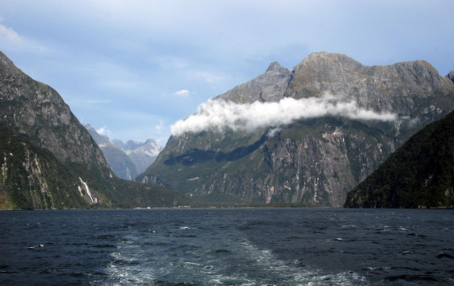 Looking  south-west down the Sound to Sheerdown Peak (1,878m) with Bowen Falls on left and terminus left centre.  The Darran Mountains visible through the notch  between Sheerdown and Barren Peak (1,5