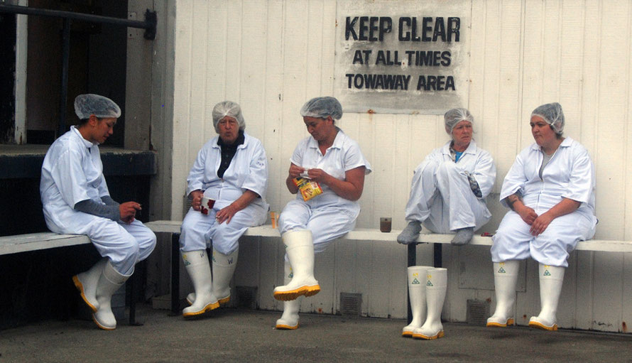 Women workers at Ngai Tahu Seafoods on a break, Bluff, NZ (iii).