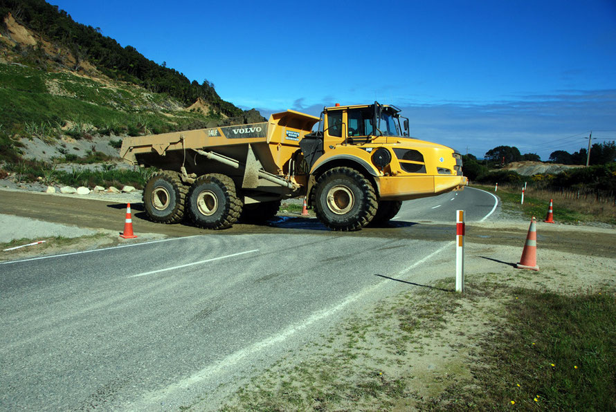 Modern small-scale gold mining across State Highway 6 between Whataroa and Ross in Westland.