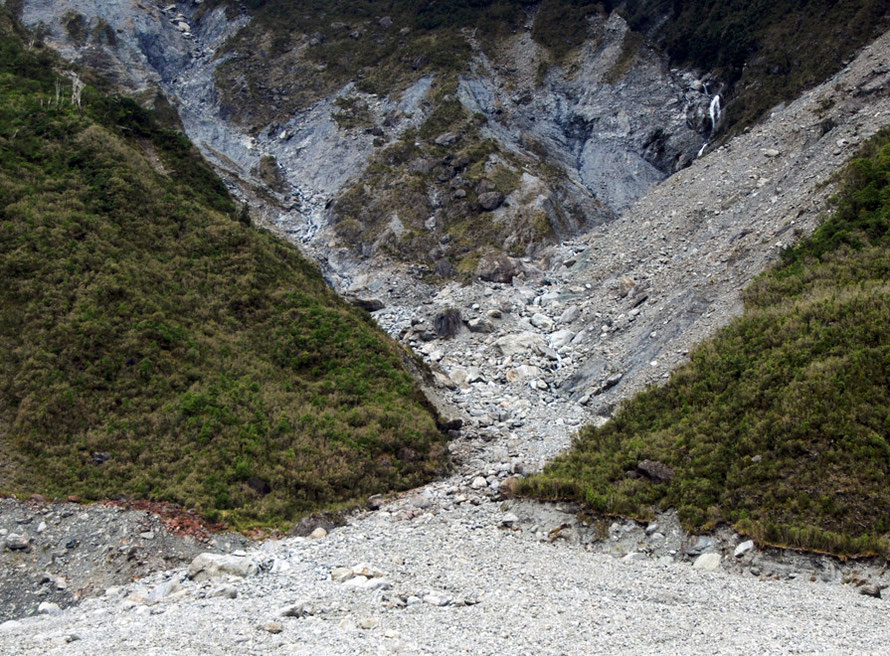 Erosion by ice is joined by erosion by mountain torrents that bring down huge amounts of debris, particularly when fed by snow meltwater in the spring and early summer