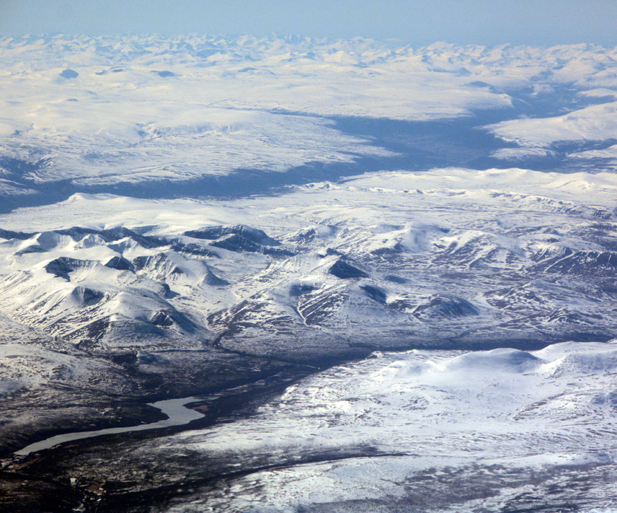 The vastness of the Norwegian Mountains spread out before us on the way to Tromsø.