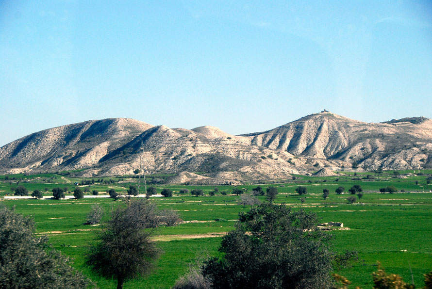 Cereal fields and the hills of the Louroujina Salient (February, 2011). Note Turkish Army Post on hilltop. 