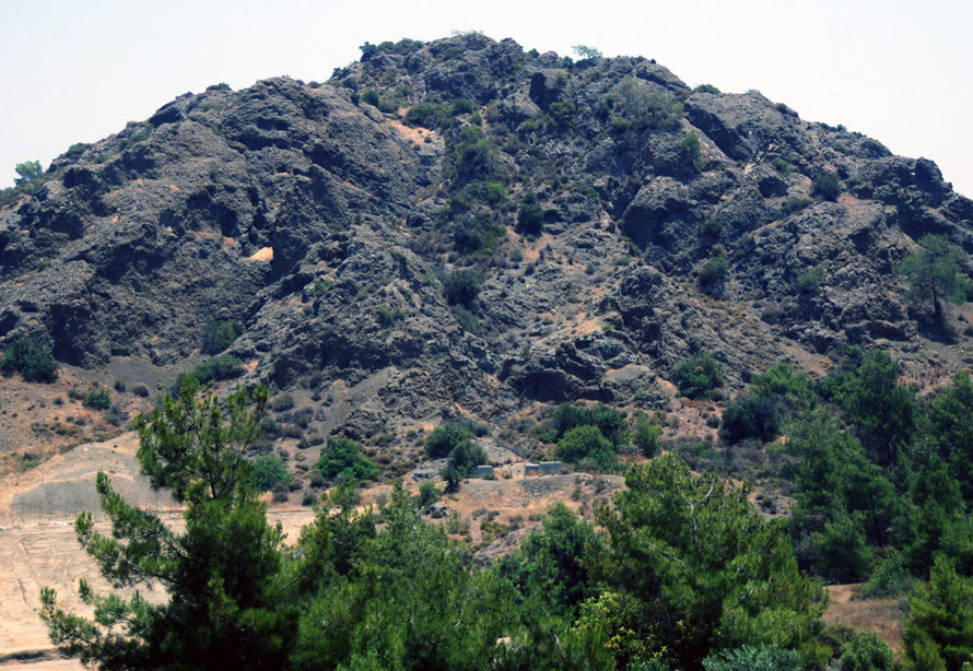 Dramatic dark basalt rocks near the Kalvassos copper mine in June 2012