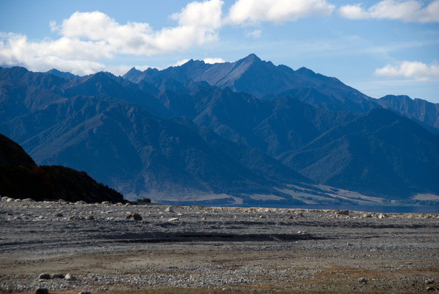 The ranges of the Southern Alps from the western shore of Lake Hawea. The McKerrow Ranges stand in front of the main spine of the Southern Alps rising to Mt Brewster at  2423m.