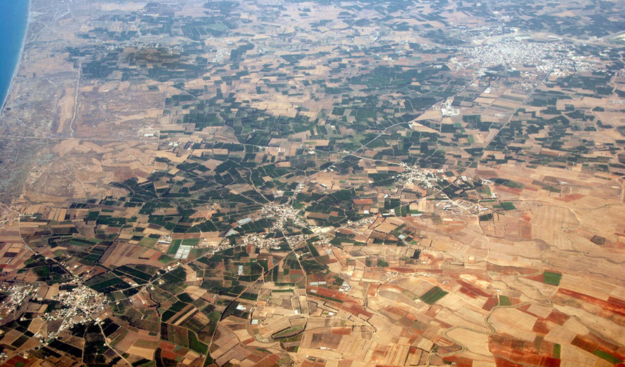 Intense citrus culitvation on the Morphou Plain - villages from left to right - Gaziveren, Aydinkoy, Nikitas and Morphou (June 2012).