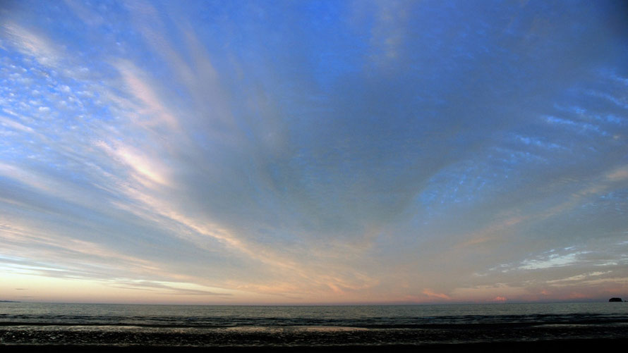 Evening light from Pohara Beach looking north out of Golden Bay.