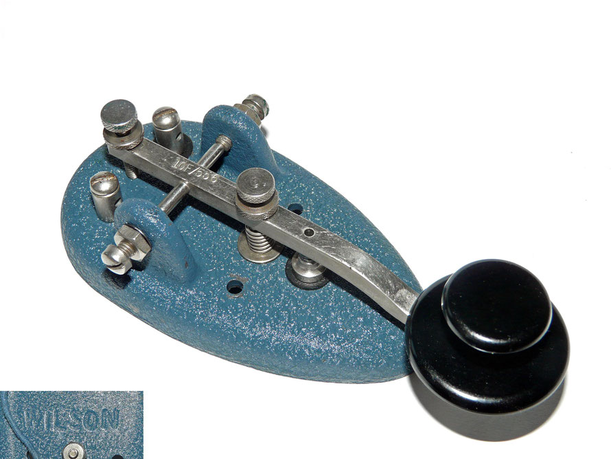  Wilson key. A chromed mechanism key and a blue wrinkle-finished tear-drop cast base. Lever stamped 10F/556.