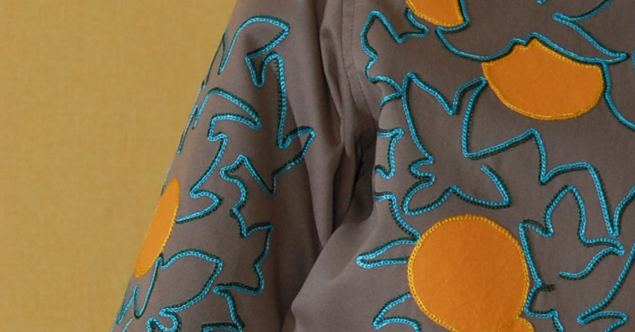 Orange  Serenade chainstitch embroidery detail