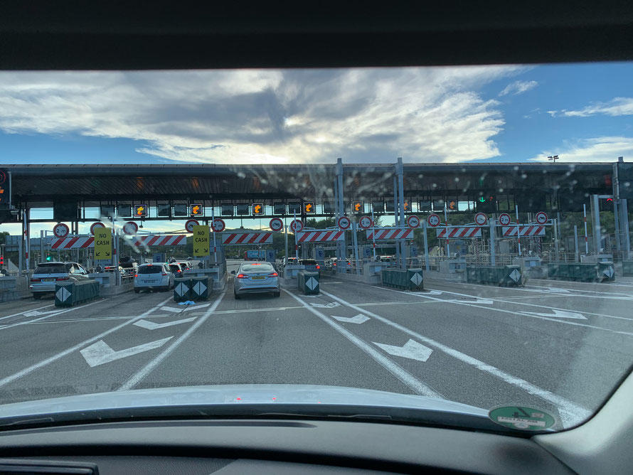 A toll station on a French  highway. The charges range from a few Euros to tens of Euros.