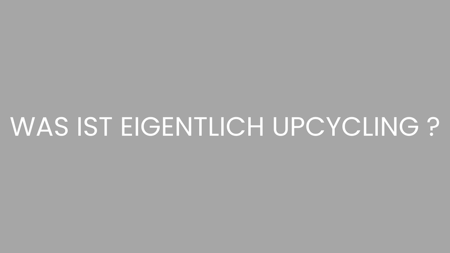 Was ist eigentlich Upcycling? Schneiderschere und Maßband im Hintergrund ein roter japanischer Kimono mit Muster, der wiederverwertet wird.