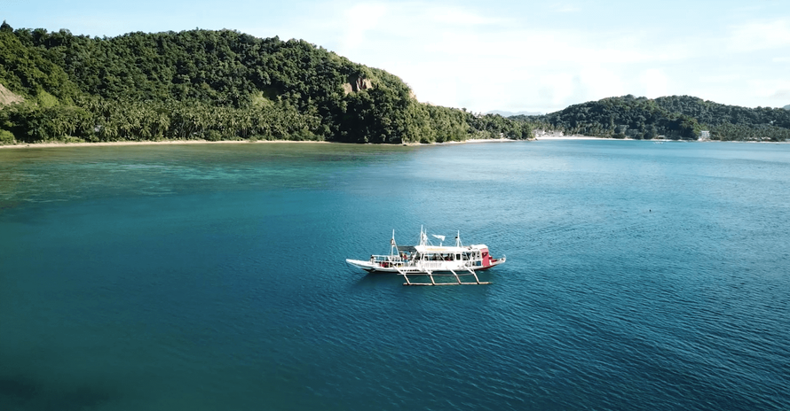 Traditional Bangka. Dive boat infront of Palawan Island