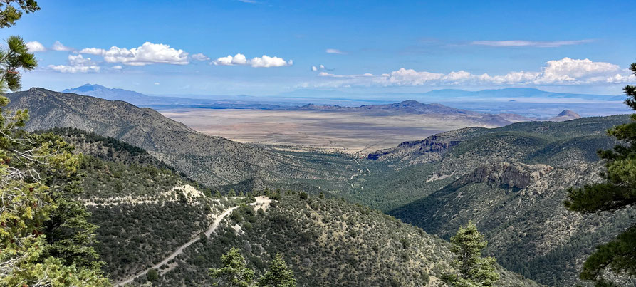 Water Canyon in the Magdalena Mountains. On the horizon are Ladrones Peak (left), the Sandias (center, very faint), and the Manzanos (right).