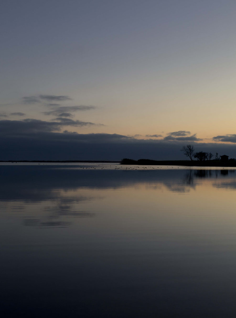 The shore in Kuressaare, Saaremaa, Estonia, during sunset and with a clear sky.