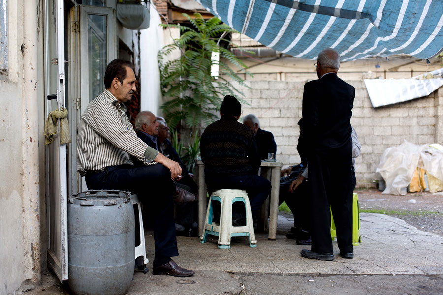 Drinking tea in the bazaar, Rasht, Iran