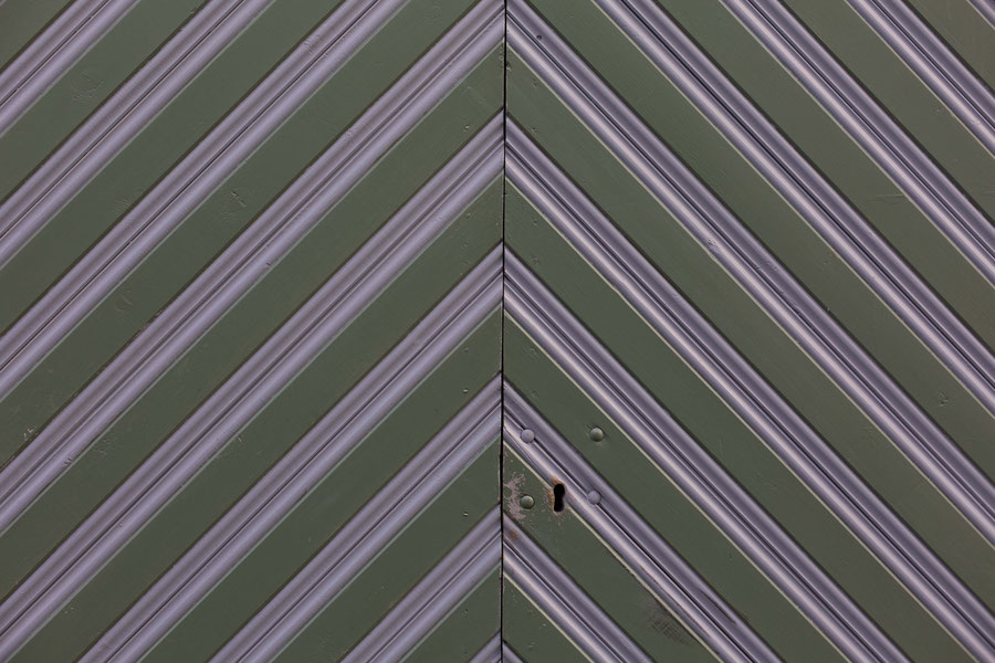 Painted wooden doors in Tallinn, Estonia.