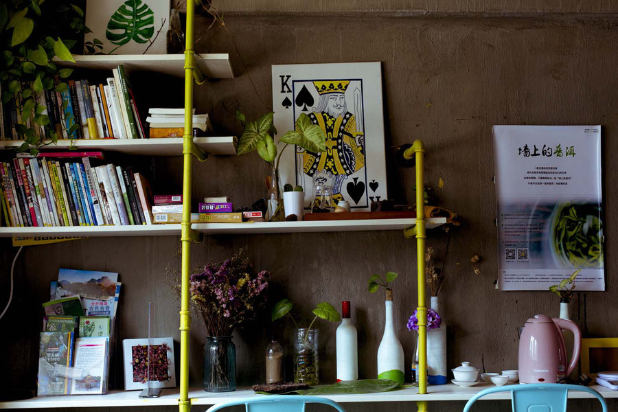 Bookshelve with water cooker and tea set, Jinghong, China