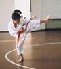 Young students kicking 'Yoko Geri Keage'