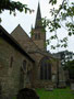 Kings Norton Church - the small round-arched window in the foreground is the Norman window reset in the chancel.