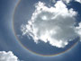 Elfenbeinküste. Dorfbesuch beim Stamm der Yacouba. Phantastischer Regenbogen.