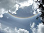 Elfenbeinküste. Dorfbesuch beim Stamm der Yacouba. Phantastischer Regenbogen.