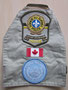 Brassard porté par par les membres de la Sûreté du Québec en mission de paix de l'O.N.U.