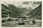 Luttach, Gemeinde Ahrntal im Pustertal mit Pfarrkirche zu den Hll. Sebastian und Rochus von Südwesten gegen die Zillertaler Alpen. Gelatinesilberabzug 9 x 14 cm; Impressum: J(ohann). F(ilibert). Amonn, Bolzano-Merano 1938.  Inv.-Nr. vu914gs01152