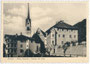 Dekanatskirche Mariä Himmelfahrt (Chiesa Arcipretale Santa Maria Assunta) und Bergrichterhaus (Palazzo del Dazio) in Primör (Fiera di Primiero). Lichtdruck 10 x 15 cm; Impressum: Nanni Gadenz, Fiera di Primiero.  Inv.-Nr. vu105ld00002