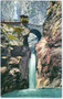 Bogenbrücke der Dolomitenstraße über dem Eggentaler Wasserfall. Photochromdruck 9x14cm; Joh(ann). F(ilibert). Amonn, Bozen um 1910.  Inv.-Nr. vu914pcd00036