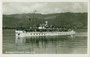 Bodensee-Motorschiff "Oesterreich" (Erbauer: Schiffswerft Korneuburg, Indienststellung 1928, Stilllegung 2009) in voller Fahrt. Gelatinesilberabzug 9 x 14 cm; Impressum: Ad(olf). JÖRG, Friedrichshafen; Souvenirstempel „2. Aug. 1936“.  Inv.-Nr. vu914gs0113