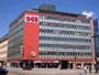 Gebäude der Landesorganisation Tirol des Österreichischen Gewerkschaftsbundes anstelle des abgebrochenen Hotel „Goldene Sonne“ in Innsbruck, Südtiroler Platz 14-16. Digitalphoto; © Johann G. Mairhofer 2013.  Inv.-Nr. 1DSC06771