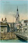 Adlerbrücke über den Eisack, Adlerbrückengasse und Pfarrkirche St. Michael mit dem Weißen Turm in Brixen am Eisack. Photochromdruck 9 x 14 cm; Impressum: Verlag Jos(ef). Bergmeister, Papierhandlung, Brixen um 1910.  Inv.-Nr. vu914pcd00207