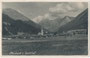 Stockach, Gemeinde Bach im Lechtal, Bzk. Reutte, Tirol mit kath. Expositurkirche St. Joseph von Südwesten gegen Allgäuer und Lechtaler Alpen. Gelatinesilberabzug 9 x 14 cm ohne Urhebernachweis, postalisch befördert 1932.  Inv.-Nr. vu914gs01190