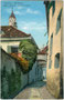 Passeirergasse im mittelalterlichen Steinach der Bezirkshauptstadt Meran, Gefürst. Grafsch. Tirol und Turm der Stadtpfarrkirche St. Nikolaus. Photochromdruck 9 x 14 cm; Impressum: Joh(ann). F(ilibert). Amonn, Bozen 1910.  Inv.-Nr. vu914pcd00299