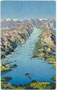 Der Gardasee - ital. Lago di Garda - vom Südufer aus gegen die Alpen. Photochromdruck (sog. "Künstlerfotochrom") nach einem Panoramagemälde eines anonymen Illustrators. Impressum: Verlag Othmar Zieher, München um 1910.  Inv.-Nr. vu914pcd00358