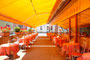 Passage zwischen Hauptbahnhof am Südtiroler Platz und Adamgasse, zugl. Terrasse vom ehem. Cafe "Cardinal" (heute: „Aida“, Adresse: Adamgasse Nr. 5) in Innsbruck-Innere Stadt. Digitalphoto; © Johann G. Mairhofer 2012.  Inv.-Nr. 1DSC03622