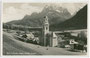 Pfarrkirche St. Peter und Paul in Sexten im Pustertal, Südtirol (erbaut 1826/27) gegen Rotwand und Elferkofel (Elfergruppe, Sextner Dolomiten). Gelatinesilberabzug 9 x 14 cm; Nic(olo). Holzer, Sesto (Sexten); postal. befördert 1931.  Inv.-Nr. vu914gs00278