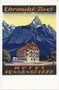 Denkmalgeschütztes Hotel "Sonnenspitze" in Ehrwald, Bezirk Reutte, Tirol; im Jahr 1914 mit Elementen des Heimatstils errichtet worden. Farbautotypie 9 x 14 cm nach einem Entwurf eines anonymen Graphikers wohl von 1914.  Inv.-Nr. vu914fat00145