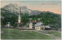 Mutters, Bzk. Innsbruck-Land, Tirol mit Pfarrkirche St. Nikolaus und Bahnhof der Stubaitalbahn gegen die Nockspitze (2.404 m.ü.A.) in den Stubaier Alpen. Farblichtdruck 9 x 14 cm; Impressum: Verlag Fritz Gratl, Innsbruck um 1905.  Inv.-Nr. vu914fld00065