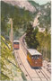 Fahrgastwägen in der Ausweiche der Mendelbahn in Kaltern im Überetsch, Gbz. Kaltern, Bzk. Bozen, Gefürst. Grafsch. Tirol (heute Bez.gem. Überetsch-Unterland, Südtirol). Photochromdruck 9 x 14 cm; Joh. F. Amonn, Bozen 1907.  Inv.-Nr. vu914pcd00365