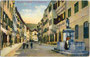 Gasthof "Kirchbergerbräu" und der Nepomukbrunnen in Bruneck, ehem. Bezirkshauptstadt in der Gefürsteten Grafschaft Tirol (heute Südtirol), Stadtgasse 62. Photochromdruck 9 x 14 cm; Impressum: Josef Werth, Toblach 1911.  Inv.-Nr. vu914pcd00326