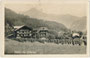 Bahnhof Fügen der Zillertalbahn, Bahnhofrestaurant zugl. Pension "Silbermayr" mit Dependance (v.r.n.l.) in Fügen, Bzk. Schwaz, Tirol gegen Rofangebirge. Gelatinesilberabzug 9 x 14 cm ohne Impressum um 1930.  Inv.-Nr. vu914gs01218