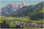 Niederdorf im Pustertal, 1868-1916 Bezirk Bruneck (heute Prov. Bozen-Südtirol mit Pfarrkirche zum Hl. Nikolaus von Nordwesten gegen die Pragser Dolomiten. Photochromdruck 9 x 14 cm; Impressum: Johann F. Amonn, Bozen 1912.  Inv.-Nr. vu914pcd00389