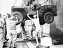 Unloading a Willys Jeep during WWII at Vaitape Harbor on Bora Bora Island